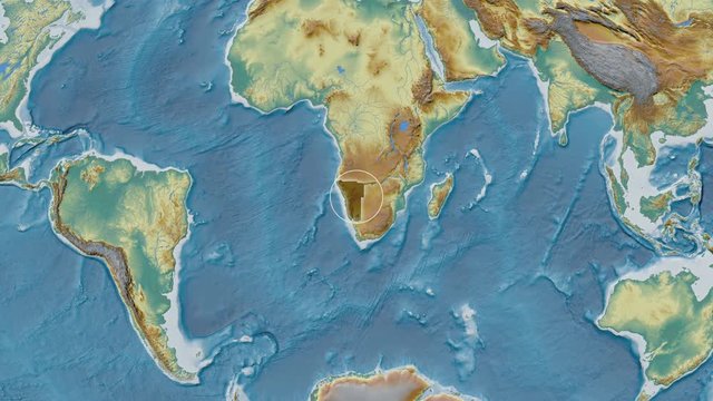 Namibia area presented against the global relief map in the Fahey projection with animated oblique transformation