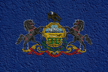Fototapeta premium US State Politics Or Business Concept: Pennsylvania Flag Wall With Plaster, Background Texture