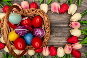 Easter symbols on wooden background