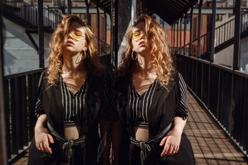 Young and fashionable overweight woman walking around town