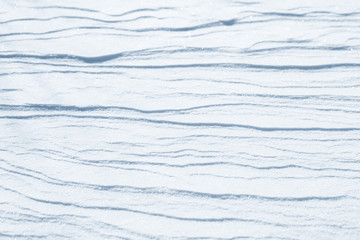 Fototapeta na wymiar Fresh snow background texture. Winter background with snowflakes and snow mounds. Snow lumps.