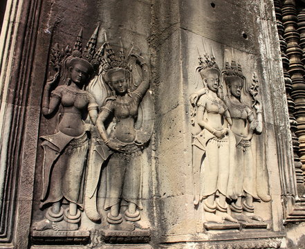 Apsara dancers stone carving on the wall of Angkor Wat temple, Siem Reap, Cambodia