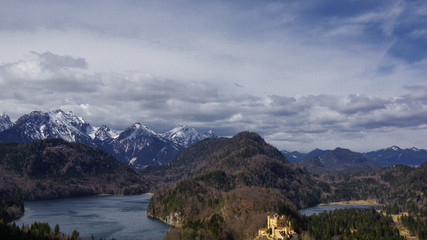 mountain panorama with clouds lake forest