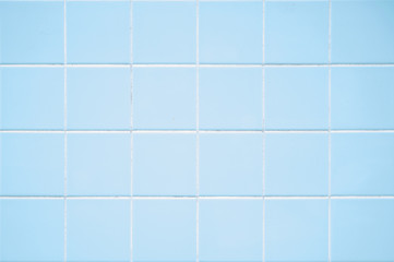 Pastel blue tiled wall background with square tiles - Powered by Adobe