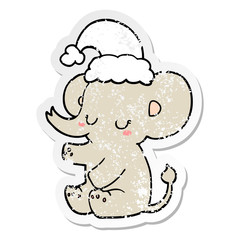 distressed sticker of a cute christmas elephant