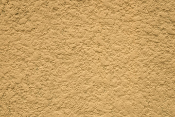 Rough, old yellow concrete wall surface texture