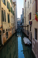 Fototapeta na wymiar Italy, Venice, a narrow canal in a city