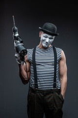  aggressive mime holding puncher