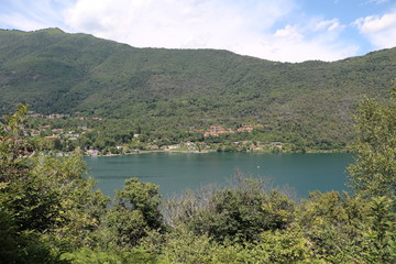 Fototapeta na wymiar Hiking trail around Lake Mergozzo in summer, Italy
