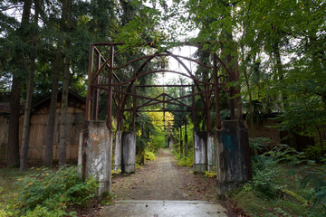 old metal gateway of abandoned pleasure garden