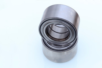 car. front suspension. wheel bearing. two pieces. stand on each other. on a white background. no isolation