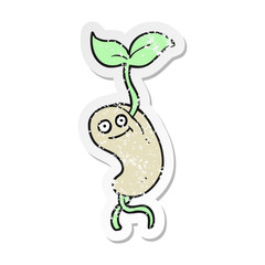 retro distressed sticker of a cartoon sprouting seed