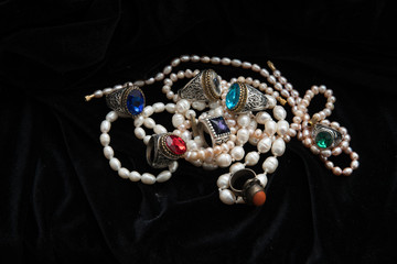 pearl necklaces and rings with glasses  from India  ("treasures")