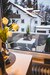 Beautiful modern interior design. Apartment inside view. View outside the window. Winter landscape. Snow outside.