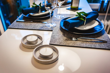 Fototapeta premium Beautiful modern interior design. Apartment inside view. Candle on a table.