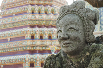 Thai statue of smiling person