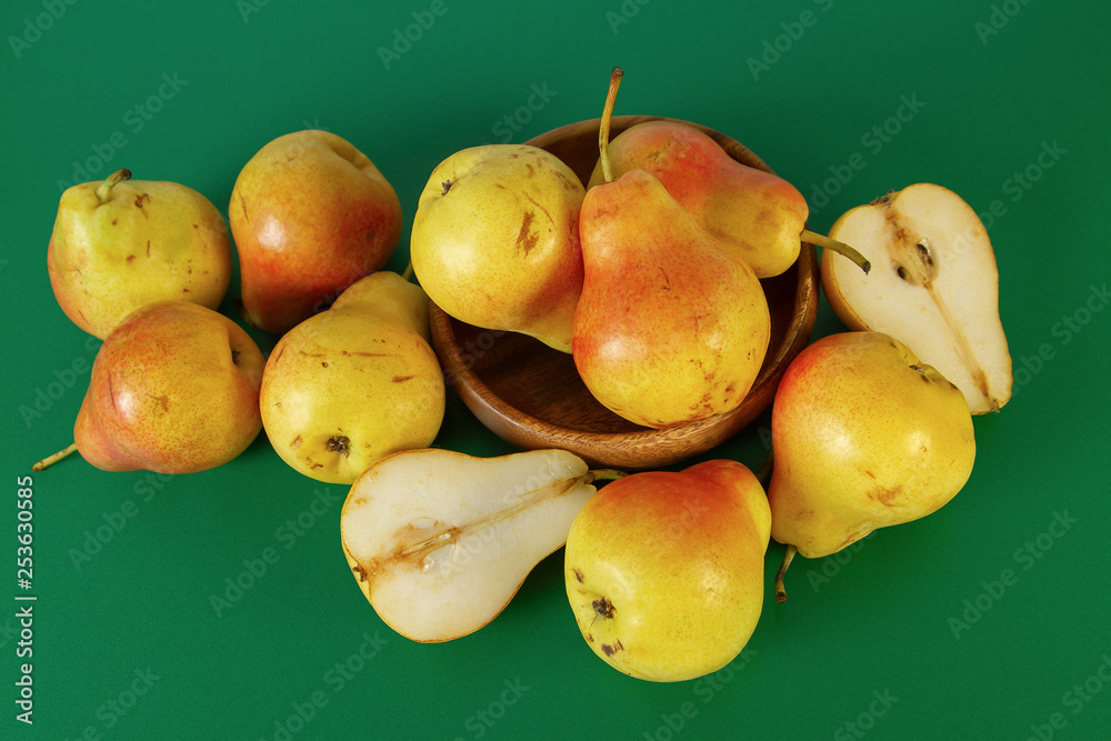 Poster Pear Bright Red Yellow Pears On Green Background