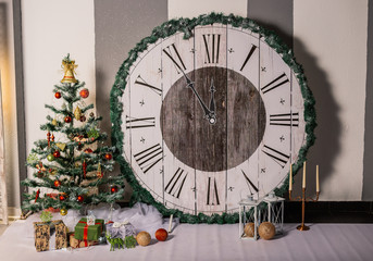 New Year's studio is framed in red and white colors. Festive Christmas interior. Cozy festive holiday atmosphere in the house.