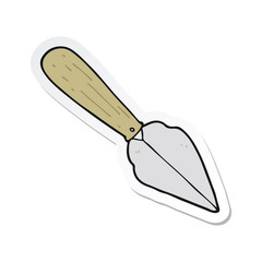 sticker of a cartoon garden trowel