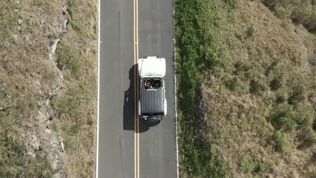 Aerial overhead, driving on road in Maui, Hawaii