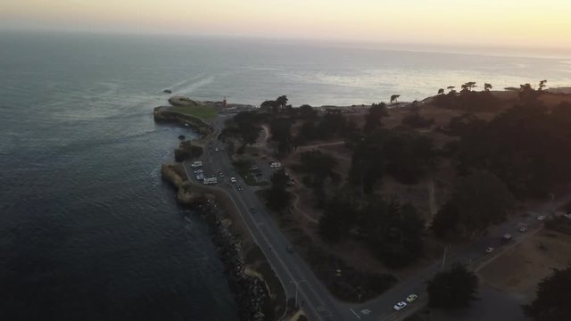 Aerial, road runs along shore of Santa Cruz, California