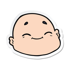 sticker of a cartoon happy bald man