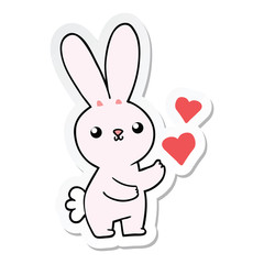 sticker of a cute cartoon rabbit with love hearts