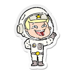 distressed sticker of a cartoon laughing astronaut