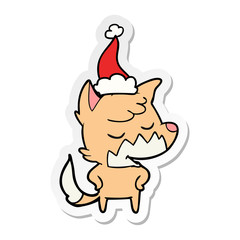friendly sticker cartoon of a fox wearing santa hat