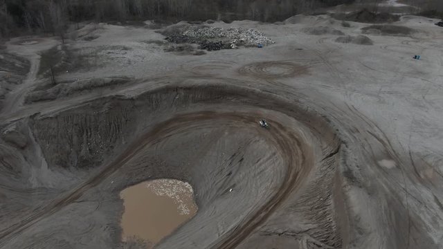 Aerial, dirt biker on track in Michigan
