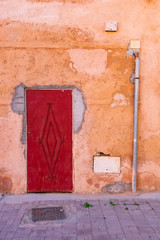 A Red Metal Door in Marrakech Morocco