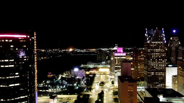 Timelapse, aerial view of Detroit, Michigan at night