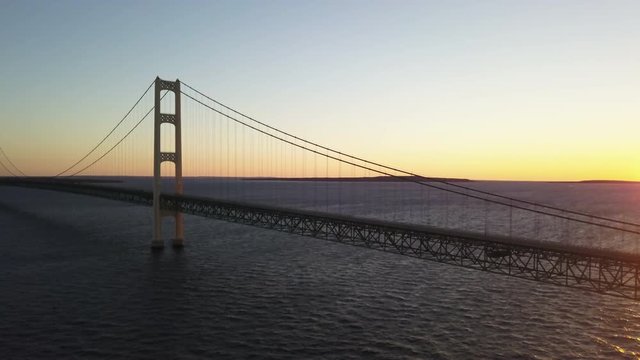 Aerial, bridge over the Great Lakes in Michigan at sunset