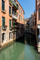 Fototapeta na wymiar Italy, Venice, San Moisè, CANAL AMIDST BUILDINGS IN CITY AGAINST SKY