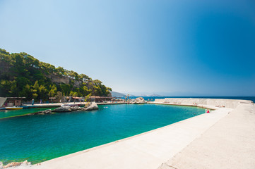 resort on blue water, water inside concrete