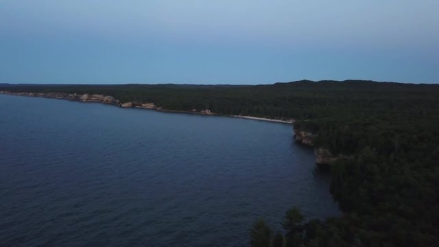 Forest on lake's shore in Munising Township, Michigan, aerial