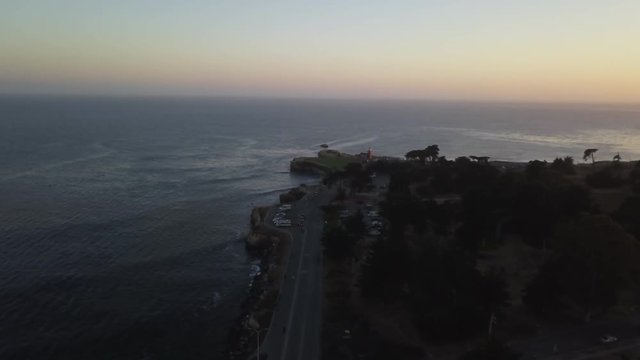 Aerial, view of road in Santa Cruz, California at sunset