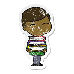 distressed sticker of a cartoon smiling boy with stack of books