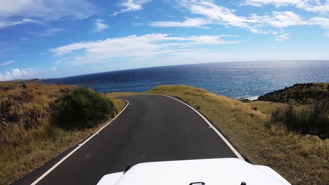 POV, scenic drive by the water in Maui, Hawaii