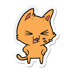 sticker of a cartoon cat hissing