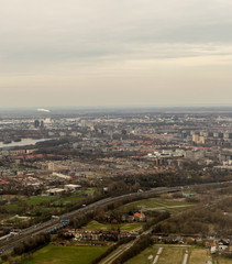 Obraz premium Netherlands, Hague, Schiphol, a large body of water with a city in the background
