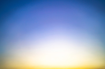 Fototapeta premium Background sky sunset,love travel to the beach orange tone,Bright in Phuket Thailand,Blue light moment.