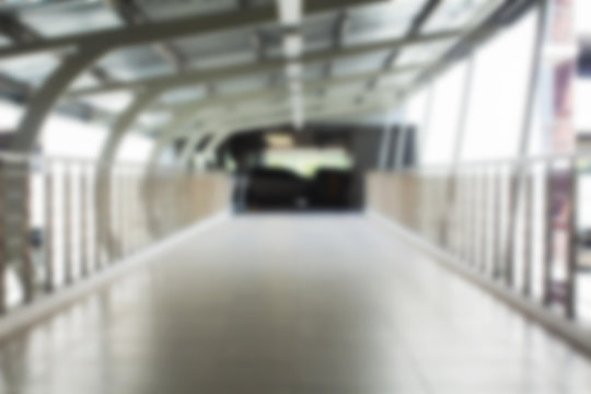 Blackground blur walkway to the garage Connect with Phuket International Airport - Powered by Adobe