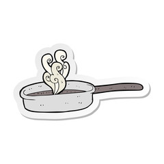 sticker of a cartoon frying pan