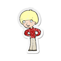 retro distressed sticker of a cartoon happy boy with hands on hips