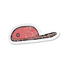 retro distressed sticker of a cartoon cap