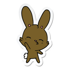 sticker of a curious waving bunny cartoon