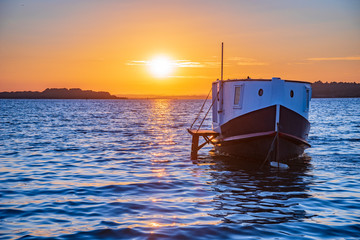 Fototapeta na wymiar Houseboats in Poole Harbour at sunset