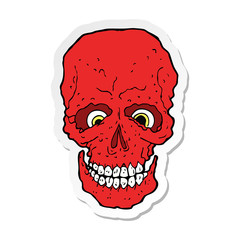 sticker of a cartoon spooky skull