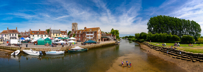 Children play in the river Frome at Wareham - obrazy, fototapety, plakaty